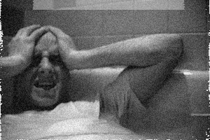 Michael (Joe McClean), stricken with psychotic nightmares, before his attempted suicide.